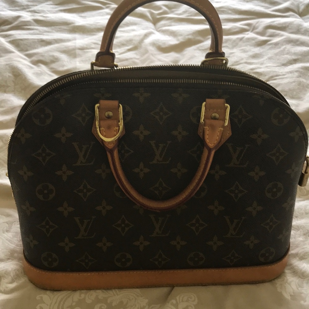 Louis Vuitton bag 2 years old